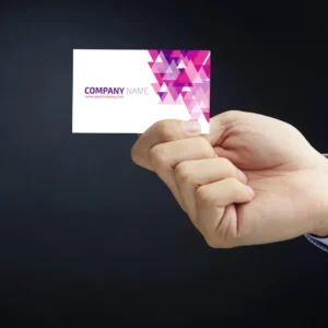 Double sided business card design held by a professional, showcasing premium double sided business card printing for UK businesses.