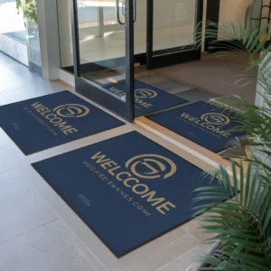 Custom floor mats for business entrances, featuring branded welcome mats that enhance professional first impressions and protect commercial flooring