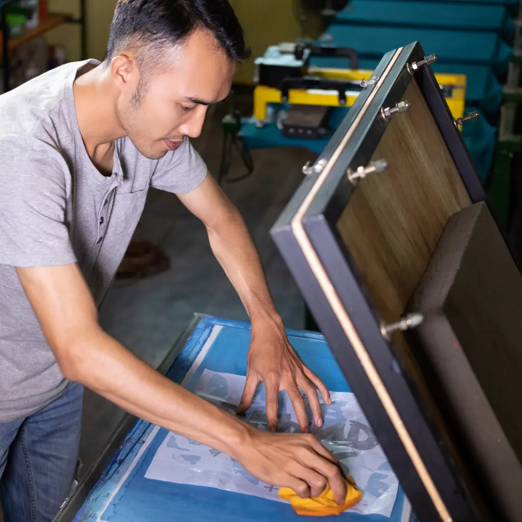 professional screen printing process used to produce high quality custom fabric posters for business and events